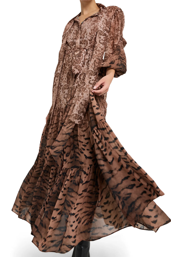 Midi silhouette dress with ruffled layers, long sleeves, animal print crepe fabric. Front view on model.