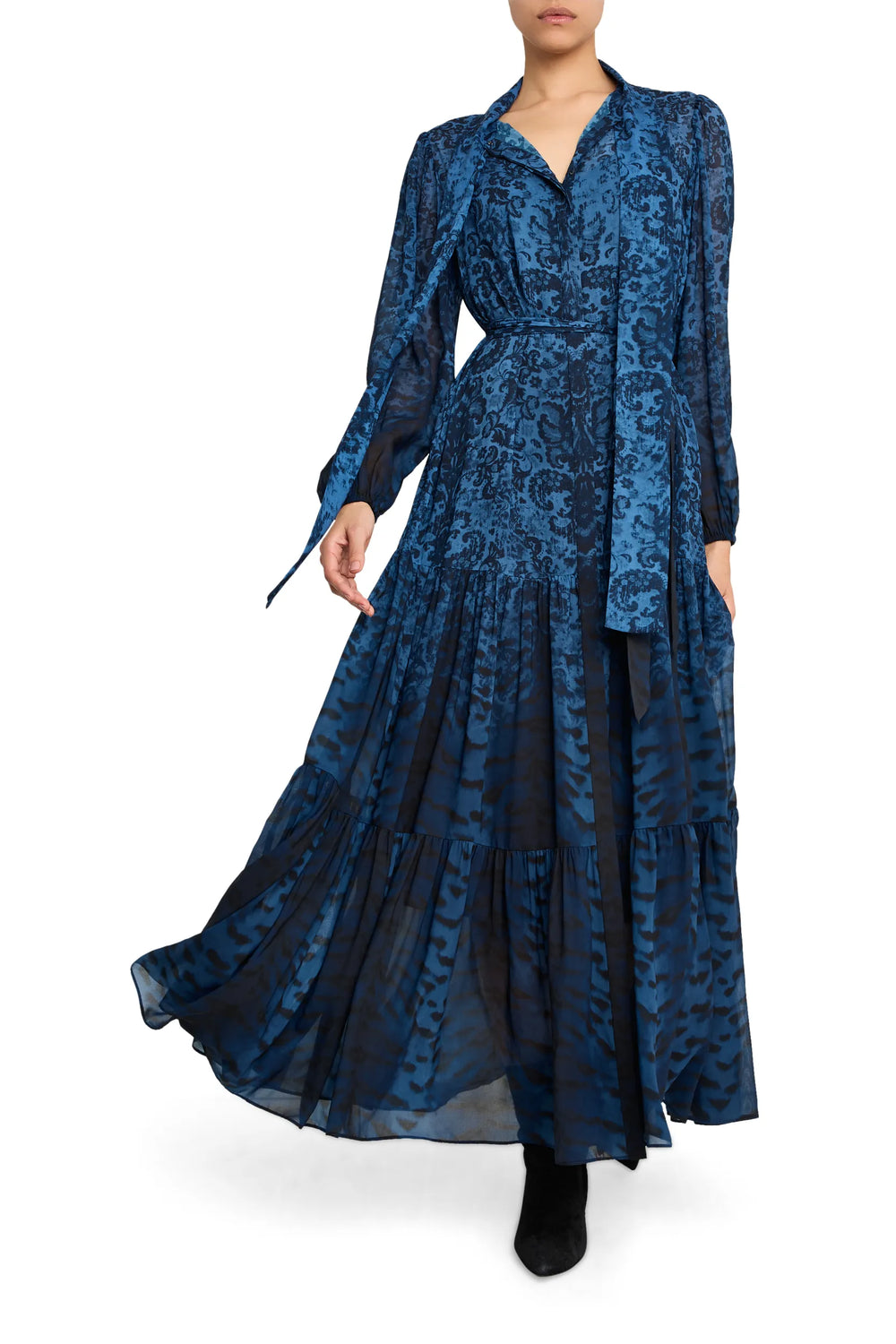 Maxi dress with long sleeves, French tapestry-inspired print, straight silhouette, front view on model.