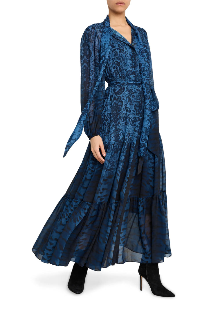 Midi dress with belted waist, fluid silhouette, and soft drape; pintucked skirt panels. Front view on model.