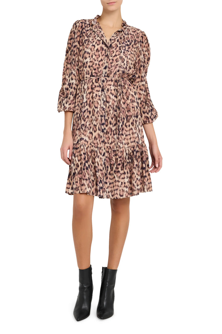Fit-and-flare midi dress with long sleeves, ruffled hem, and allover printed crepe. Front view on model.