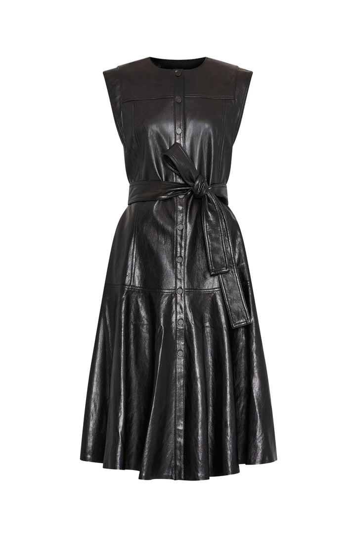 Sleeveless vegan leather shirtdress with front buttons, chest flap pockets, and tied waist belt; front view on white.