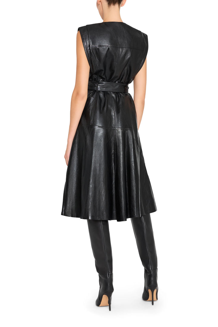 Sleeveless vegan leather dress with belted waist, midi silhouette, seam detailing; back view on model.