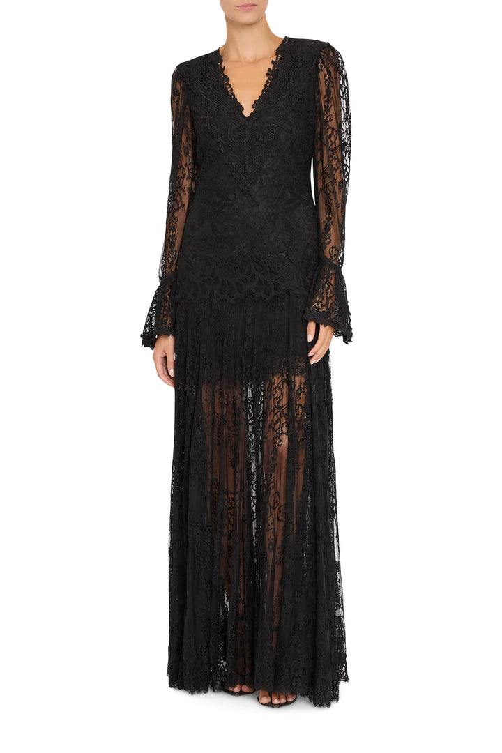 Tori Long Lace Dress in black Chantilly lace, V-neckline and long flared sleeves, front view on model.