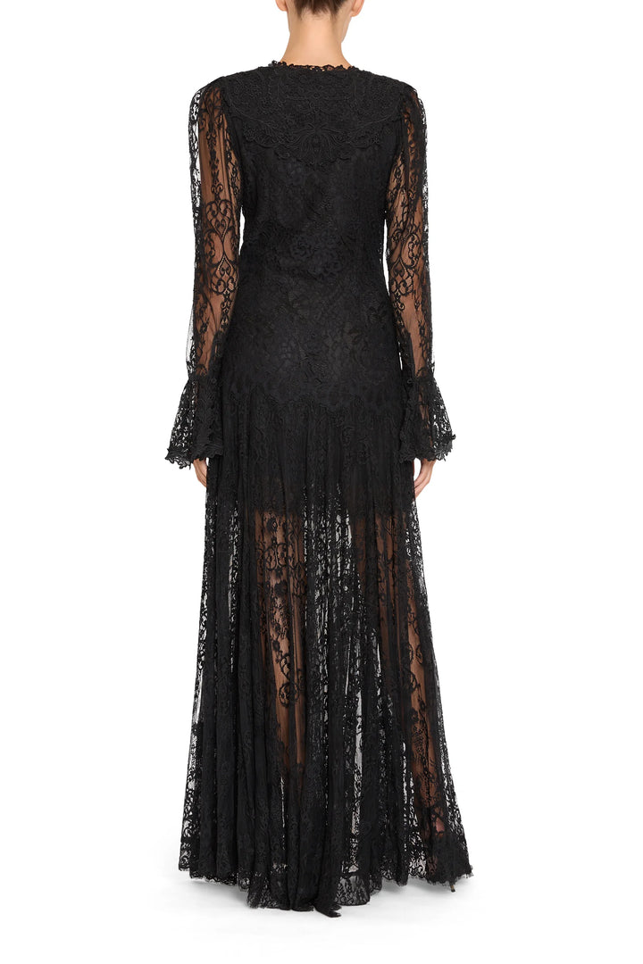 Tori Long Lace Dress in Chantilly lace with long sleeves and flared cuffs, back view on white.