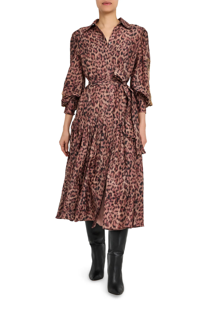 Animal print midi dress with long sleeves, fluid silhouette and simple crewneck. Front view on model.