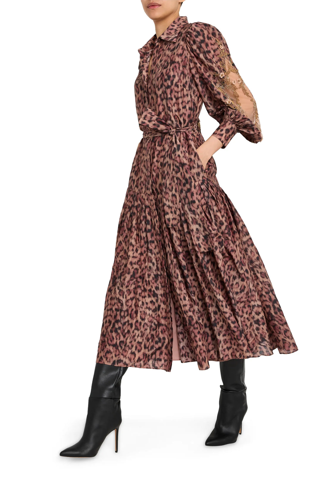 Long animal print dress with lace sleeves, fluid silhouette, fitted waist; front view on model.
