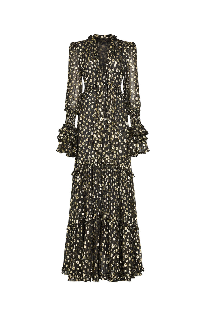 Sheer maxi dress with long sleeves, ruffle cuffs, tiered skirt, floral polka dot jacquard; front view on white.