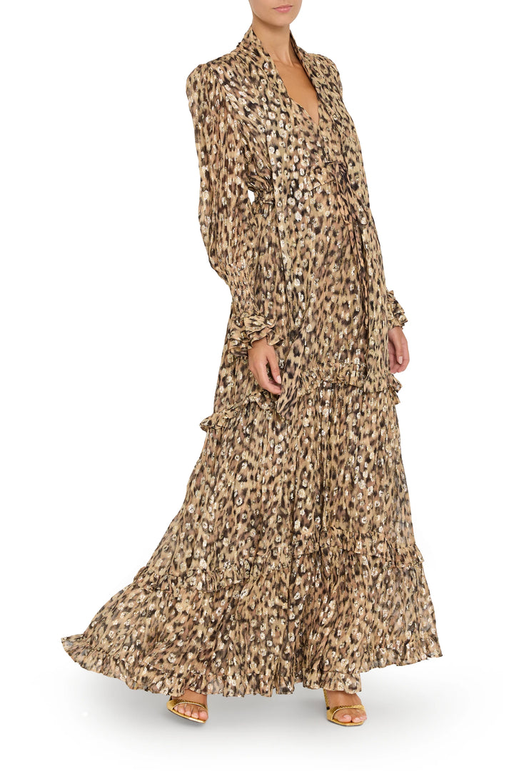 Midi dress with long sleeves, ruffled hem, animal print crepe; fitted waist. Front view on model.