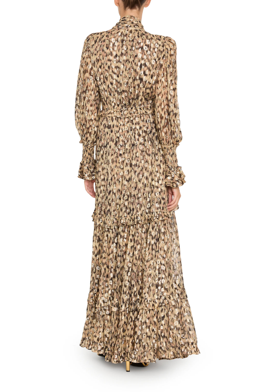 Ankle-length dress with long sleeves, ruffled trim, fluid silhouette, shown from back view on model.