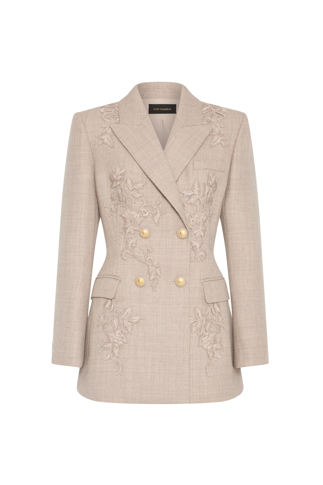 Beige double-breasted blazer, structured silhouette, gold buttons, floral embroidery front, front view on white.