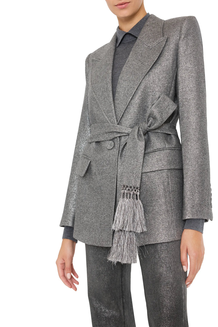 Metallic wool jacket with structured silhouette, notched lapel, and tasseled belt; front view on model.