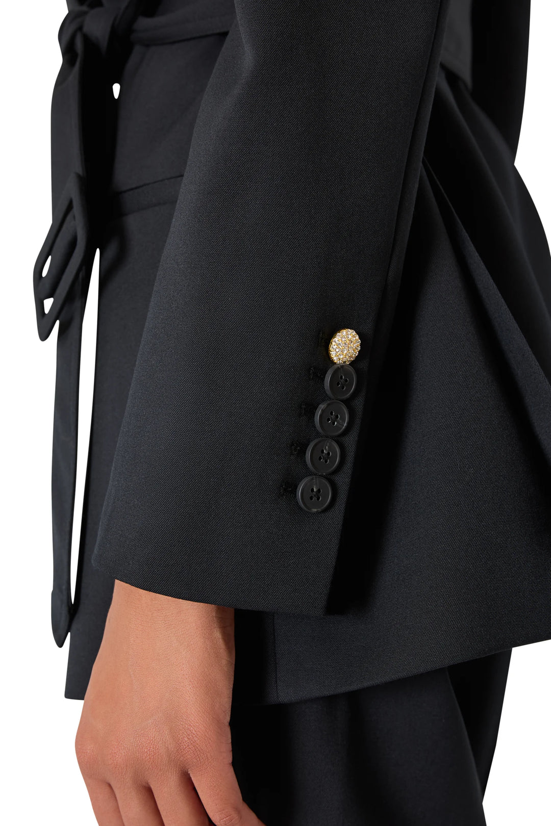 Jillian Jeweled Belted Blazer sleeve with one gold-tone jeweled button above three black buttons, detail view.