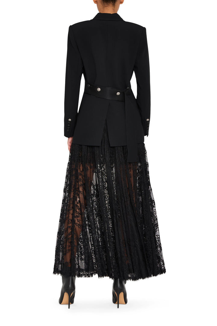 Single-breasted crepe blazer with structured shoulders and back vent, tailored fit; back view on model.