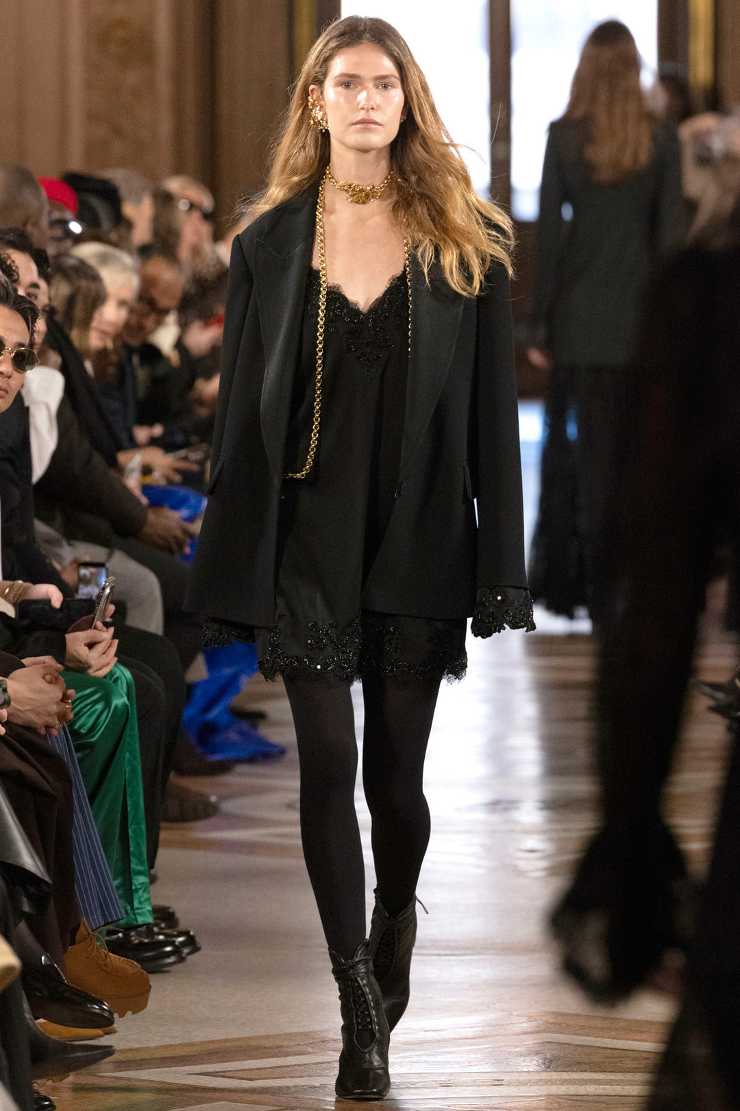 Mini dress with fitted silhouette, crepe fabric, structured bodice, short hemline; front view on model.