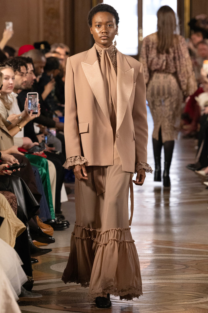 Tailored blazer in satin back crepe with structured shoulders and single-breasted front, front view on model.