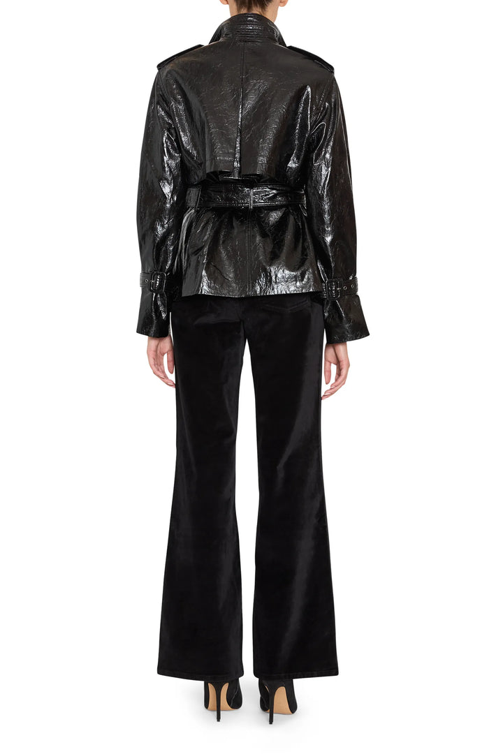 Cropped vegan leather trench with structured shoulders, wide lapels, and button front; back view on model.