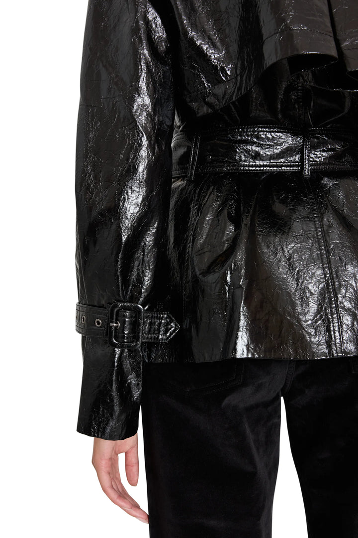 Cropped vegan leather trench with structured silhouette, paneled construction; back view on model.