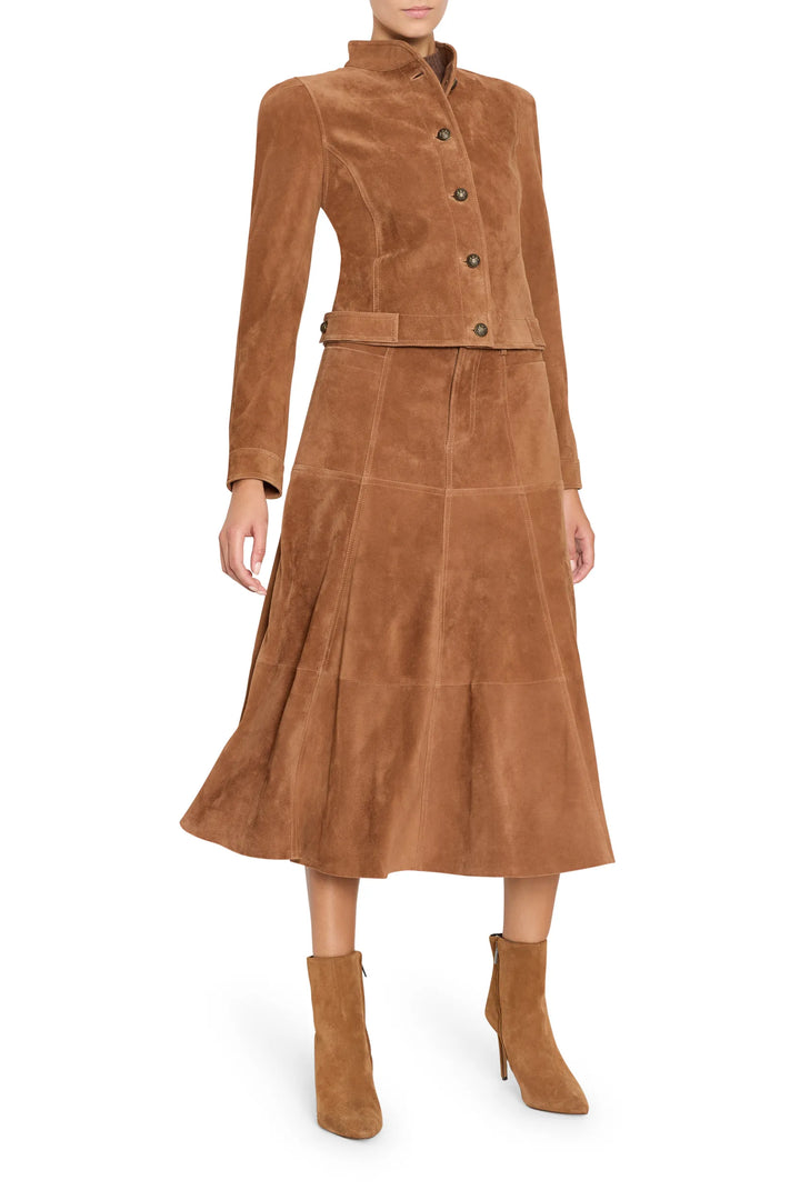 Suede jacket with tailored silhouette, structured seams, and front closure. Front view on white.