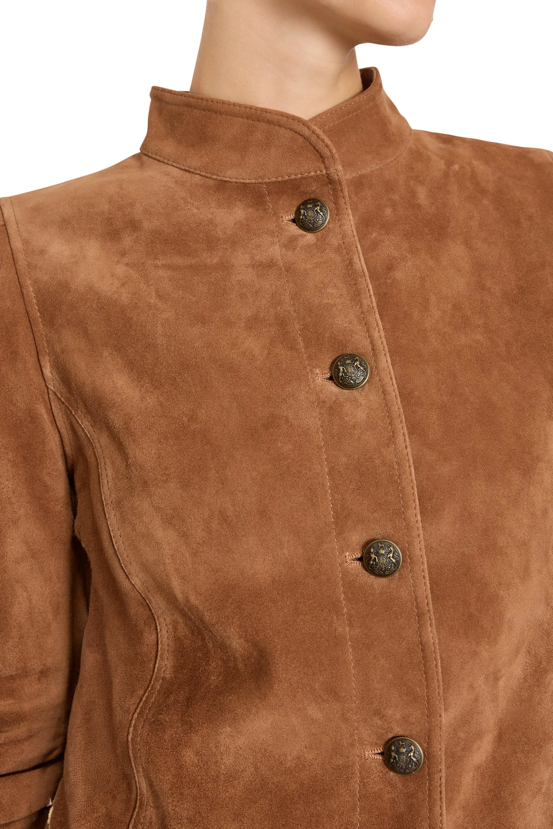 Cropped military-style suede jacket with high collar and four metal buttons; detail view.