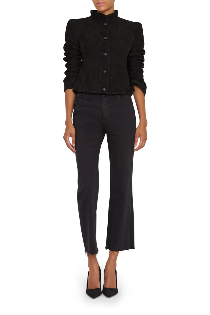 Suede jacket with structured silhouette, tailored seams, front pockets. Front view on white.
