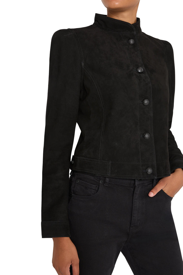 Suede jacket with structured silhouette, snap front, notched collar, angled seams; front view on model.