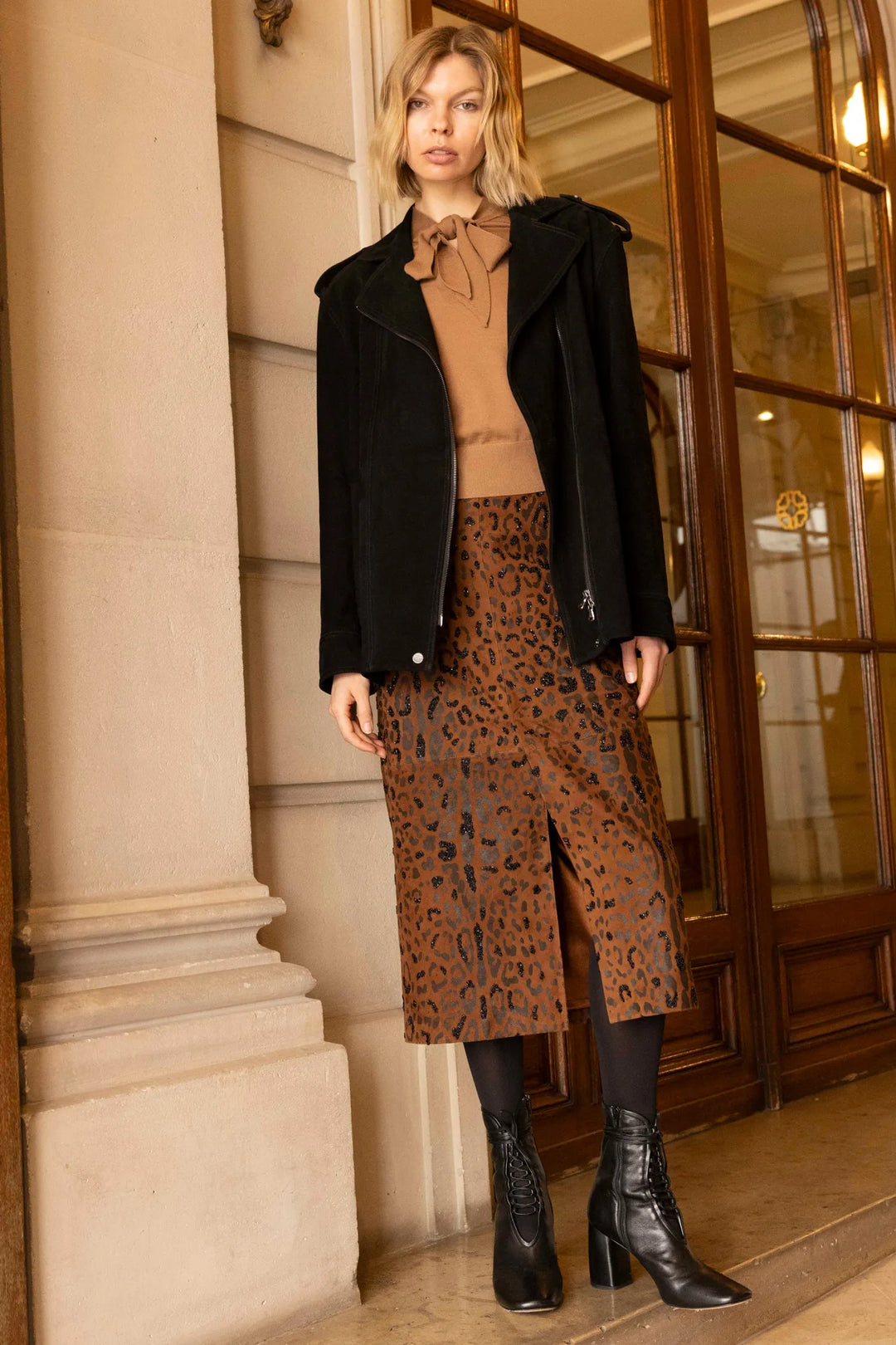 Relaxed fit, high neck Felicity Sweater with ribbed hem and cuffs, straight silhouette; front view on model.