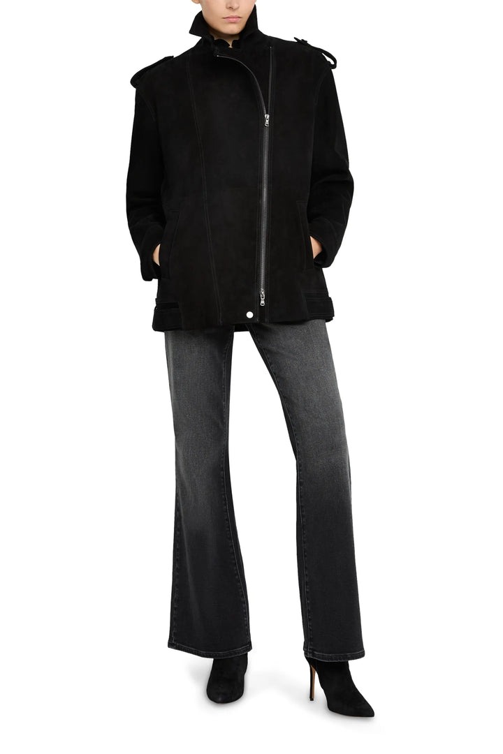 Moto-style suede jacket with classic collar, zip front, and welt pockets; tailored silhouette; front view on model.