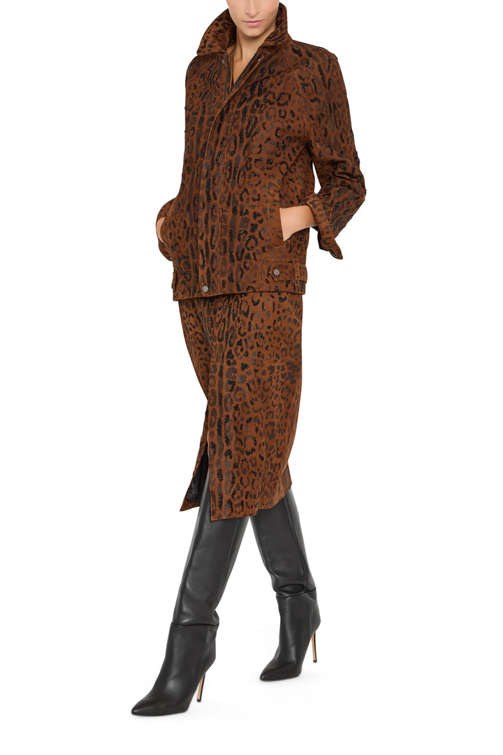 Leopard suede jacket with a structured silhouette and welt pockets, front view on model.