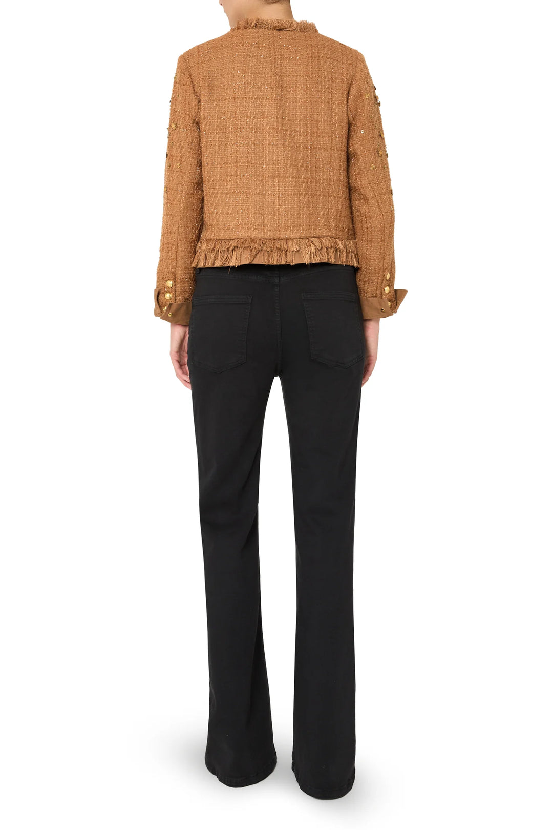 Tweed jacket with structured silhouette, tailored seams, and classic collar. Back view on model.