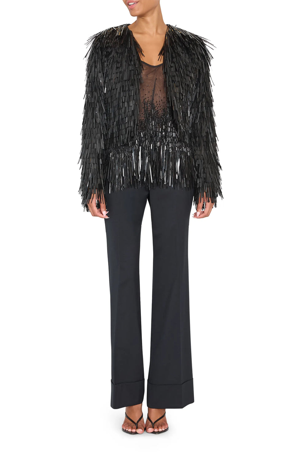 Structured, collarless embellished jacket with open front and ornate detailing; front view on white.