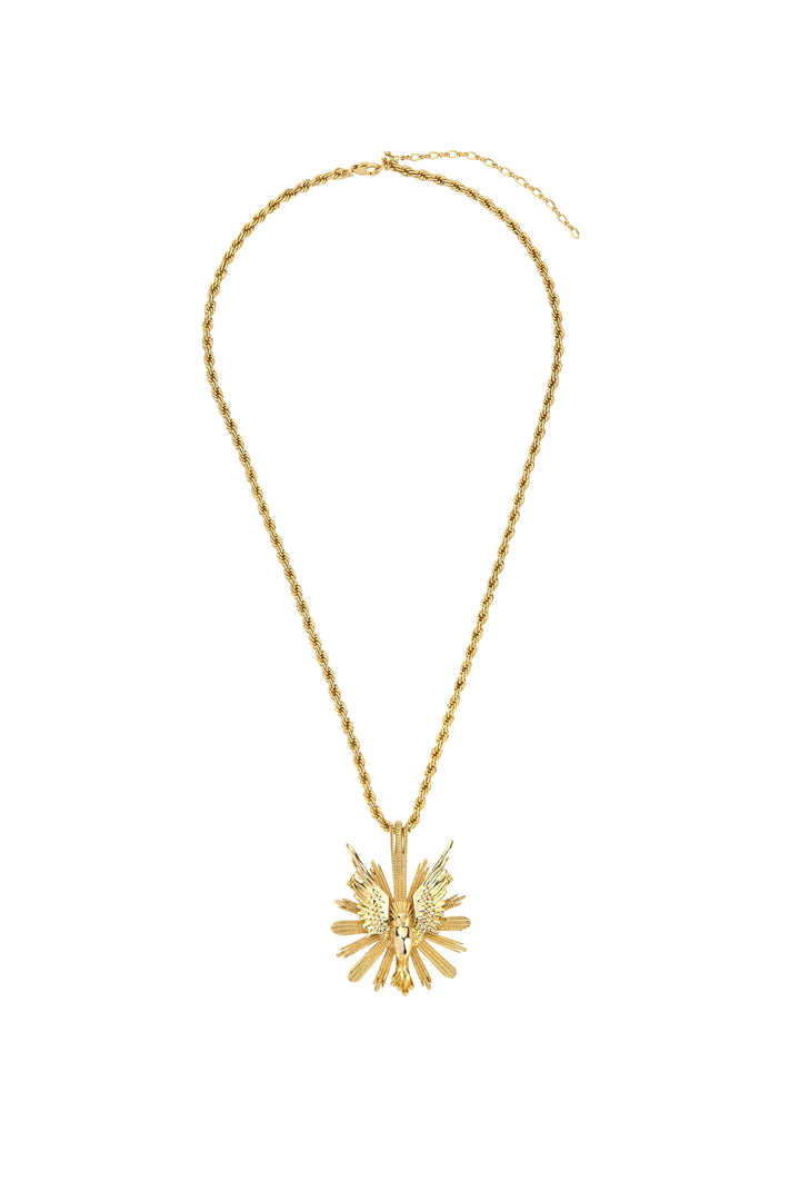 Gold chain necklace with large ornate bird pendant, detailed outstretched wings; front view on white.