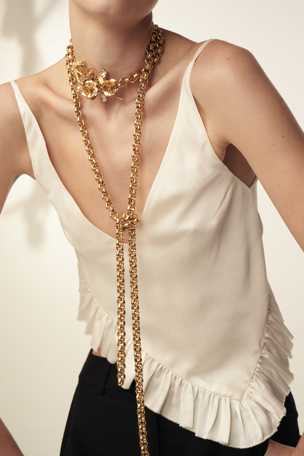 Handcrafted Moon Necklace with delicate pendant and fine chain, minimalist construction, front view on model.