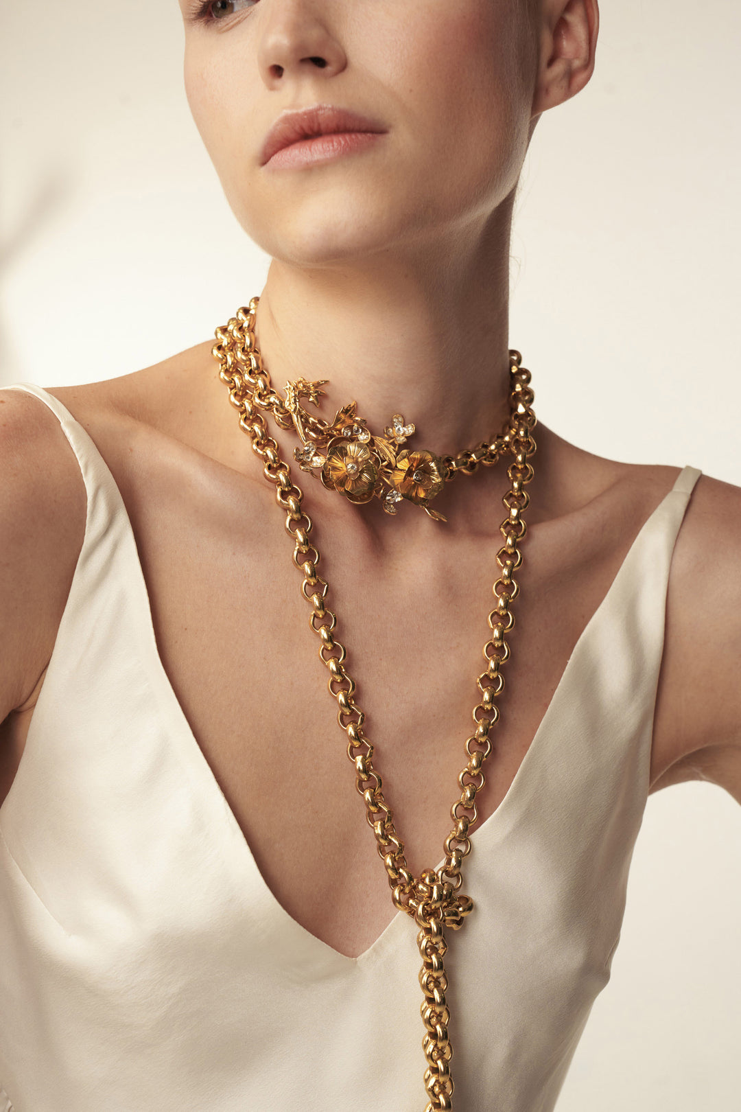 Handcrafted Moon Necklace with intricate pendant and delicate chain, front view on model.