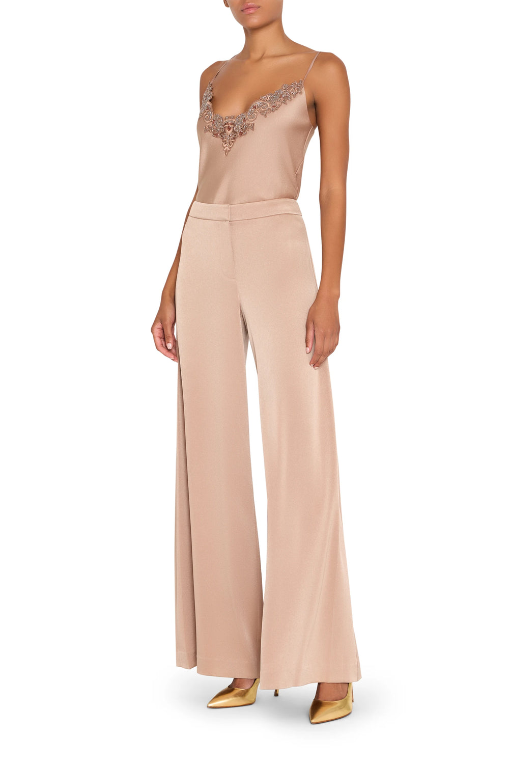Wide-leg crepe pant with fluid silhouette and tailored waistband, full-length hem. Front view on model.