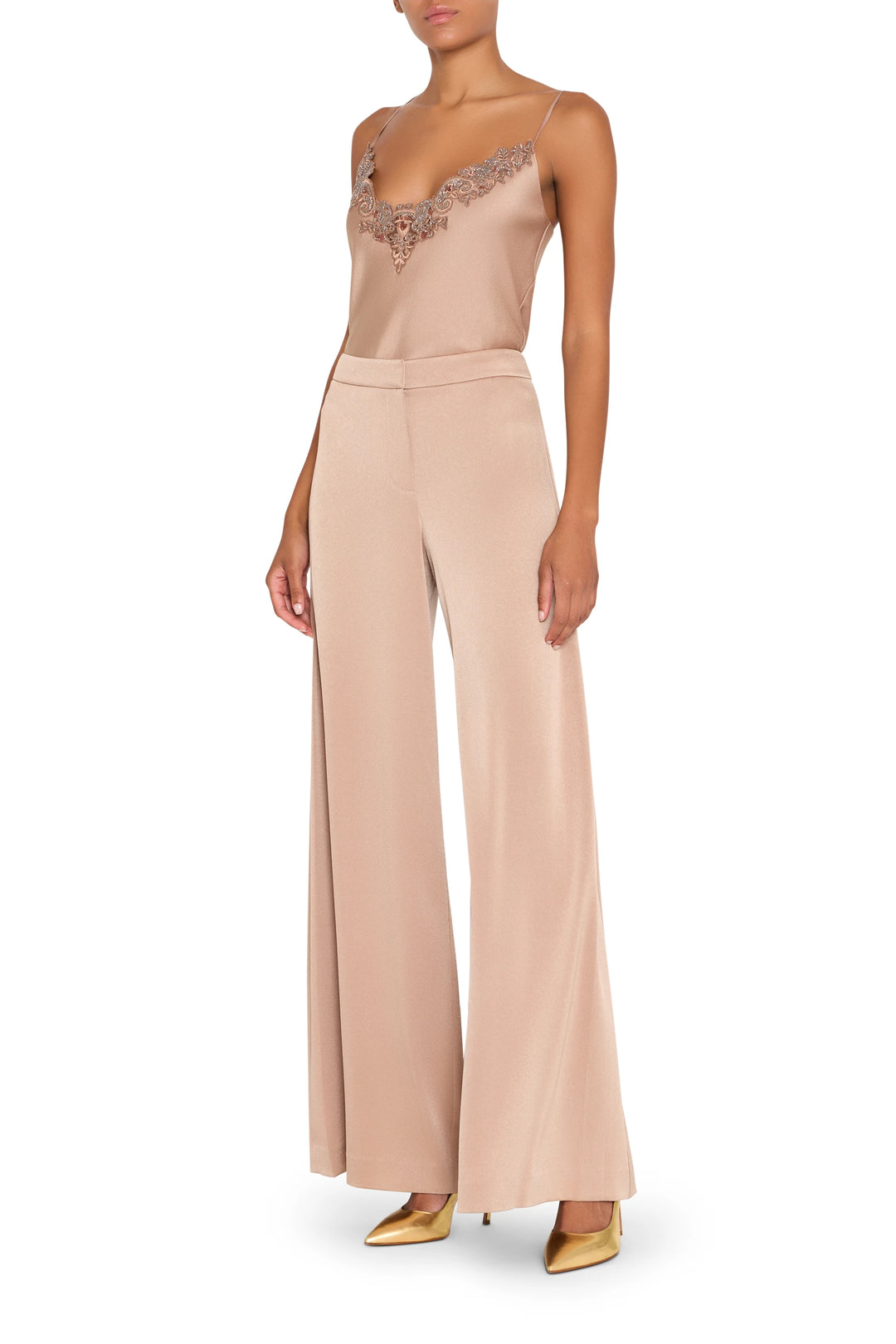 Wide-leg crepe pant with fluid silhouette and tailored waistband, full-length hem. Front view on model.