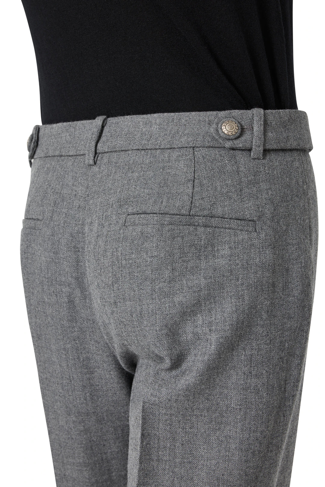 Wide-leg flannel pant with wide cuffs, side and back pockets; structured silhouette. Side view on model.