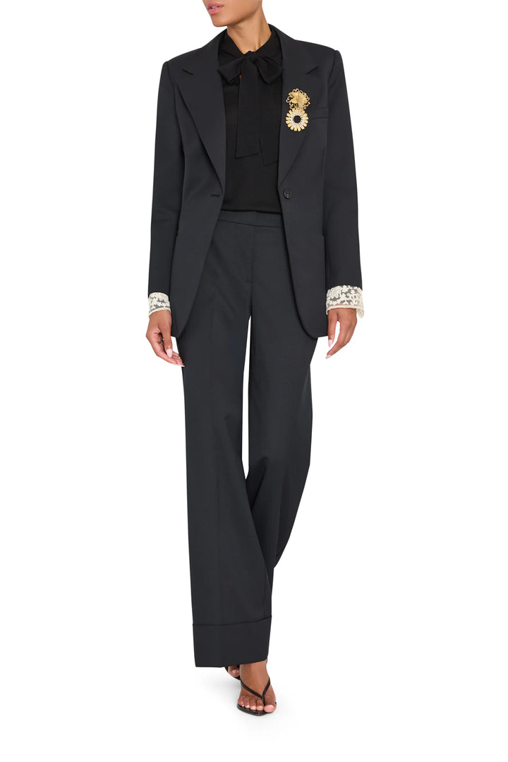 Kenny Twill Pant: full-length, straight-leg tropical wool trousers with cuffs, front view on model.