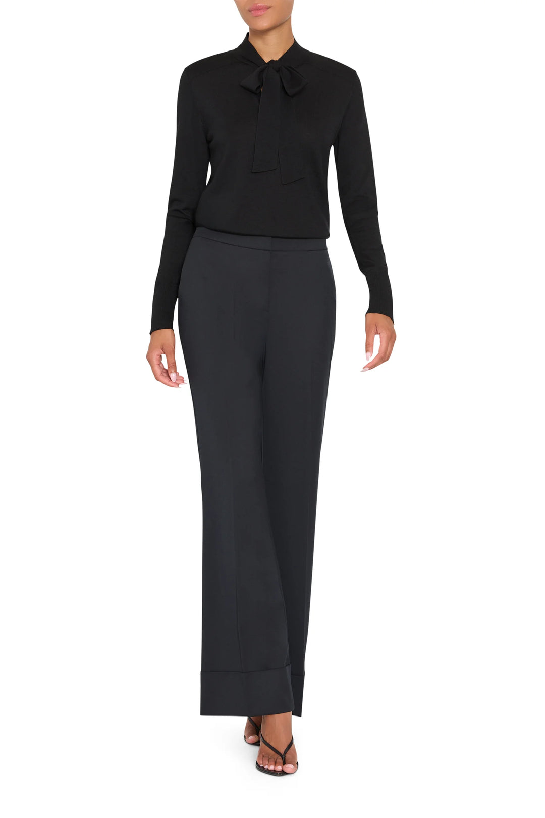 Kenny Twill Pant in black tropical wool with a cuffed hem, front view on model.