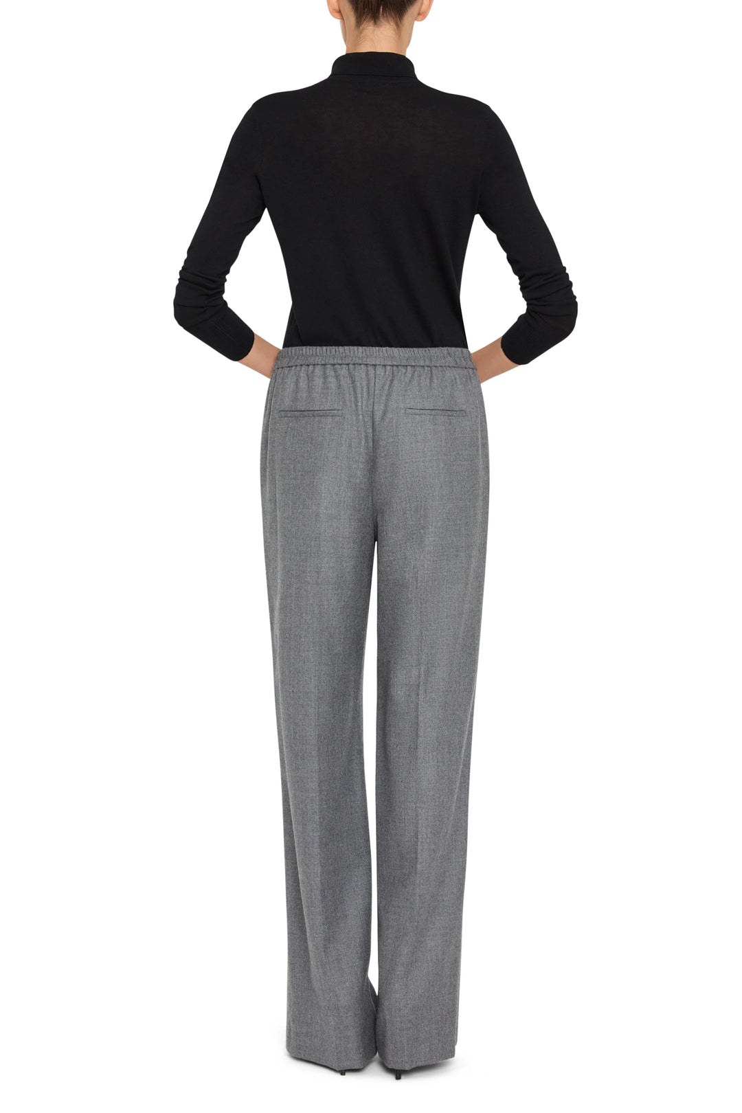 Wide-leg flannel pant with elastic waistband, clean hem, soft texture. Back view on model.