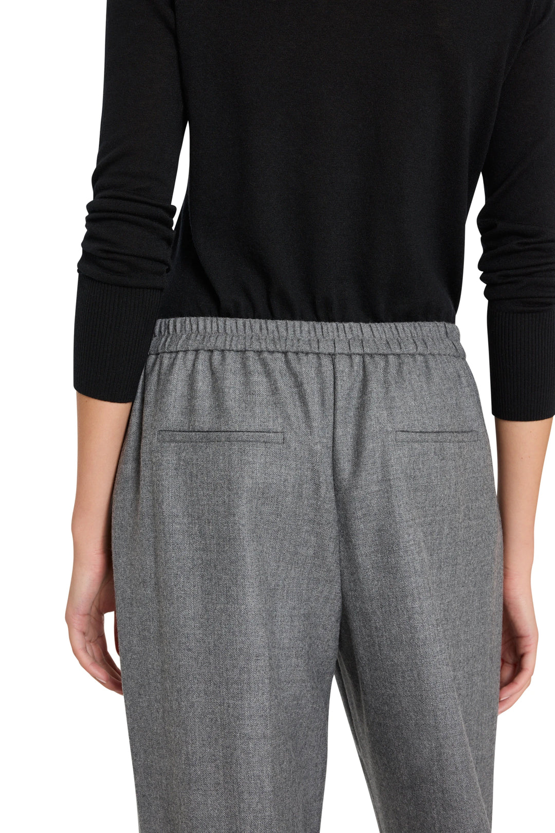 Wide-leg gray flannel pant with elastic waist and pull-on design, back view on model.