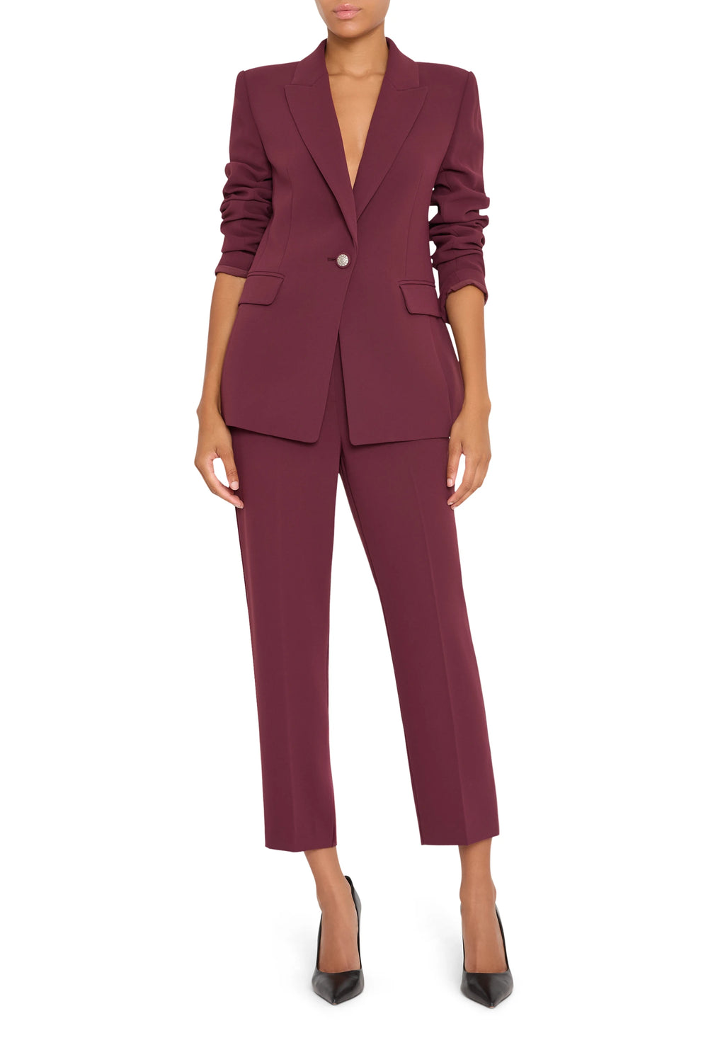 Slim ankle-length crepe pant with flat waistband and pull-on construction, front view on white.