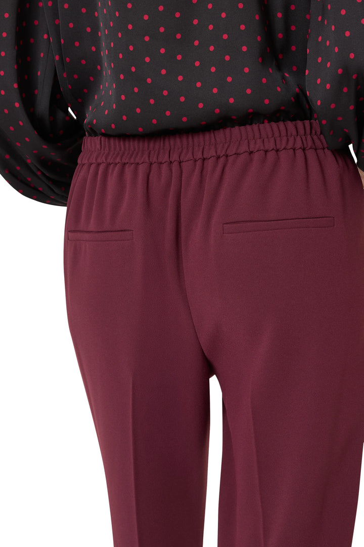 Straight-leg crepe ankle pant with pull-on waistband and clean finish, maroon, front view on white.