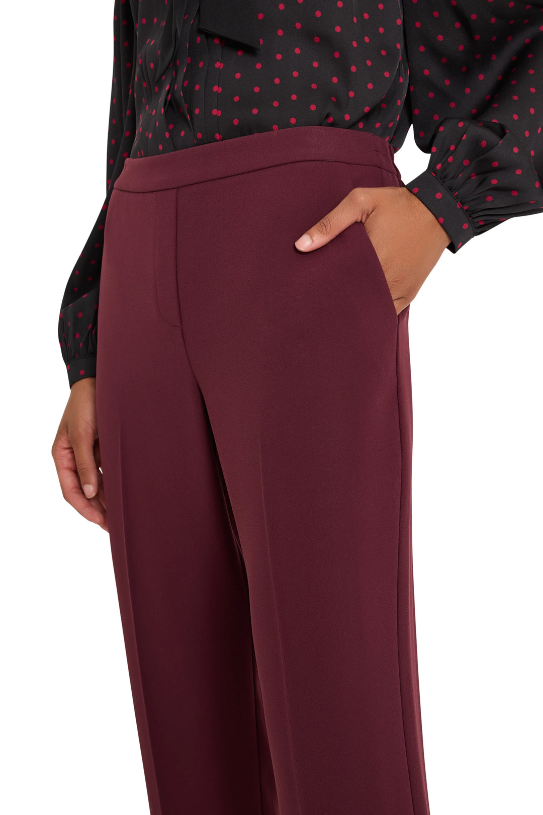 Straight-leg crepe ankle pant with pull-on waistband, minimal detailing, fluid drape; front view on model.