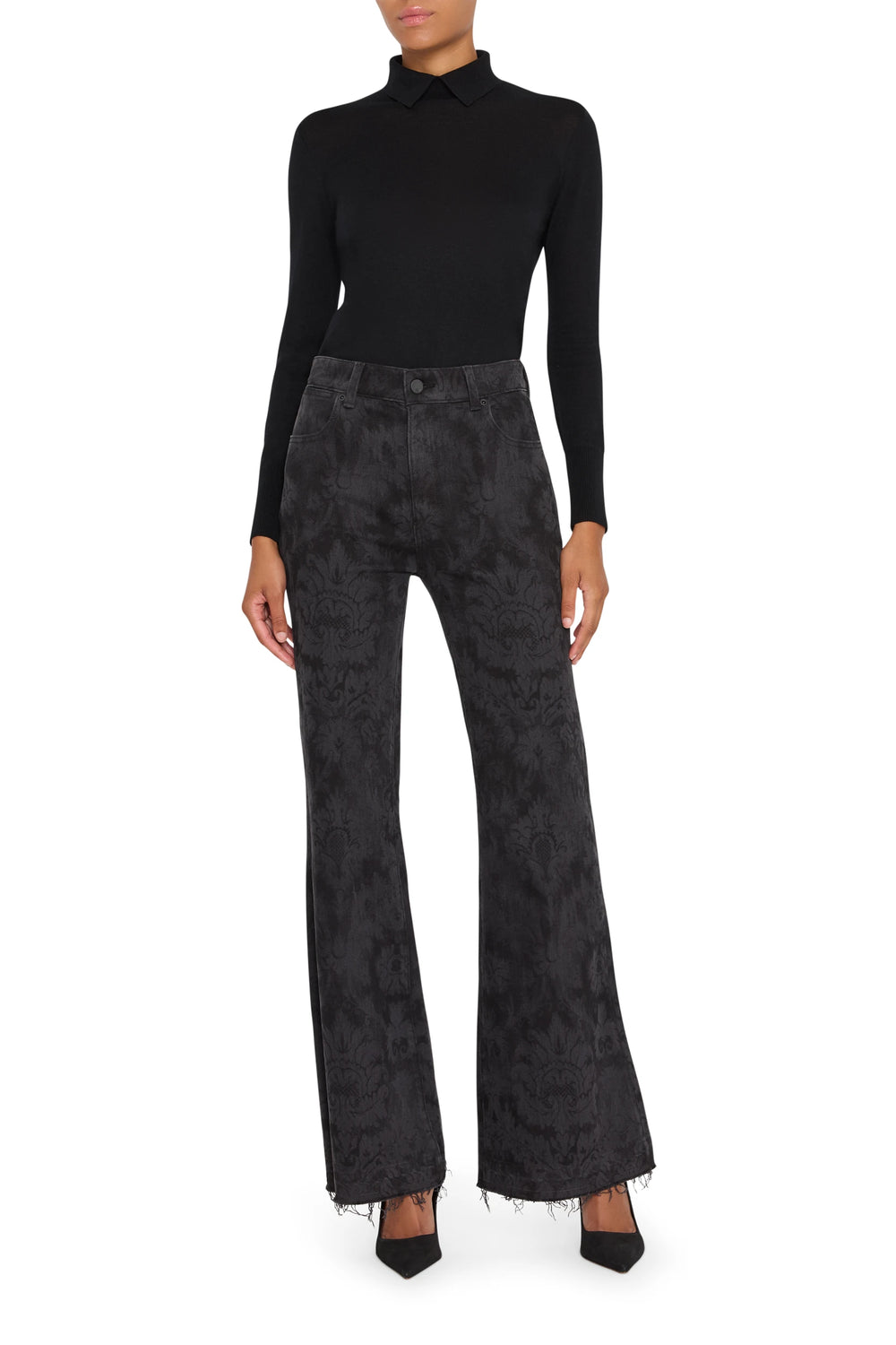 Wide-leg jeans with allover print, flared silhouette, frayed hems. Front view on model.
