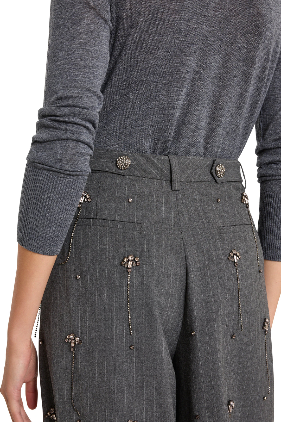 Wide-leg pant in crepe with chain embellishments and tailored construction; front view on model.