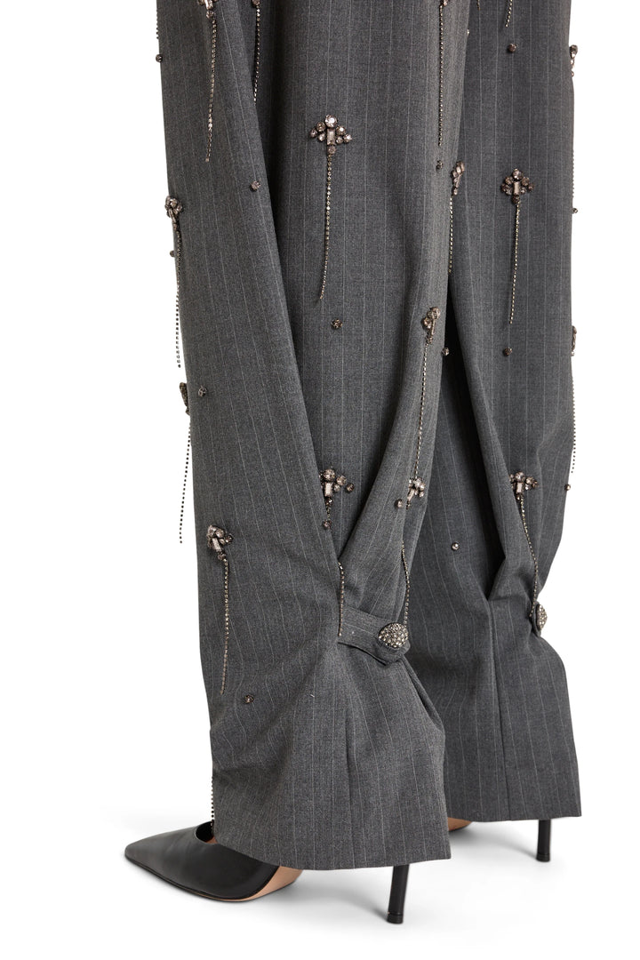 Barrel-leg gray pinstripe trousers with gathered cuffs, tailored waistband, front view on white.