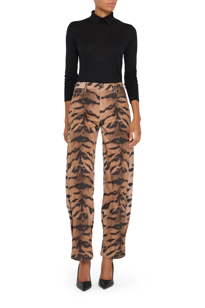 Wide-leg denim pant with allover animal print and five-pocket construction, front view on model.
