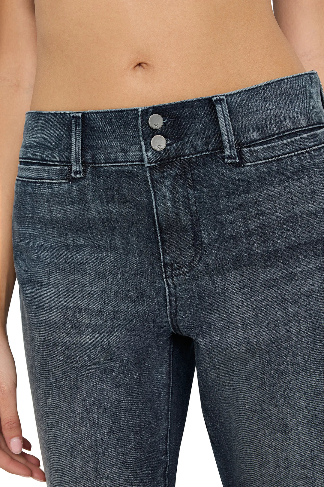 Close-up of Lulu Jeans high-waisted double button waistband and tailored denim construction, detail view.