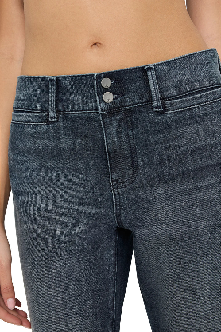 Close-up of Lulu Jeans high-waisted double button waistband and tailored denim construction, detail view.