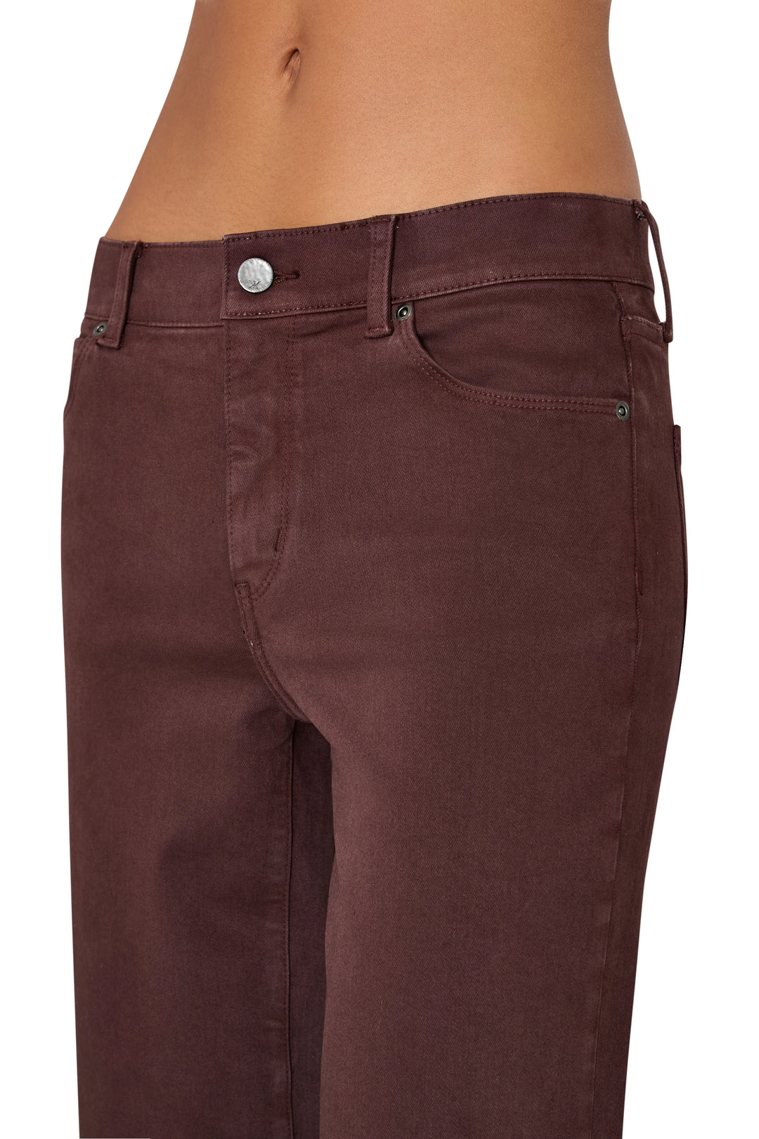 Coated jean with cropped, straight-leg silhouette and defined waistband construction, detail view.